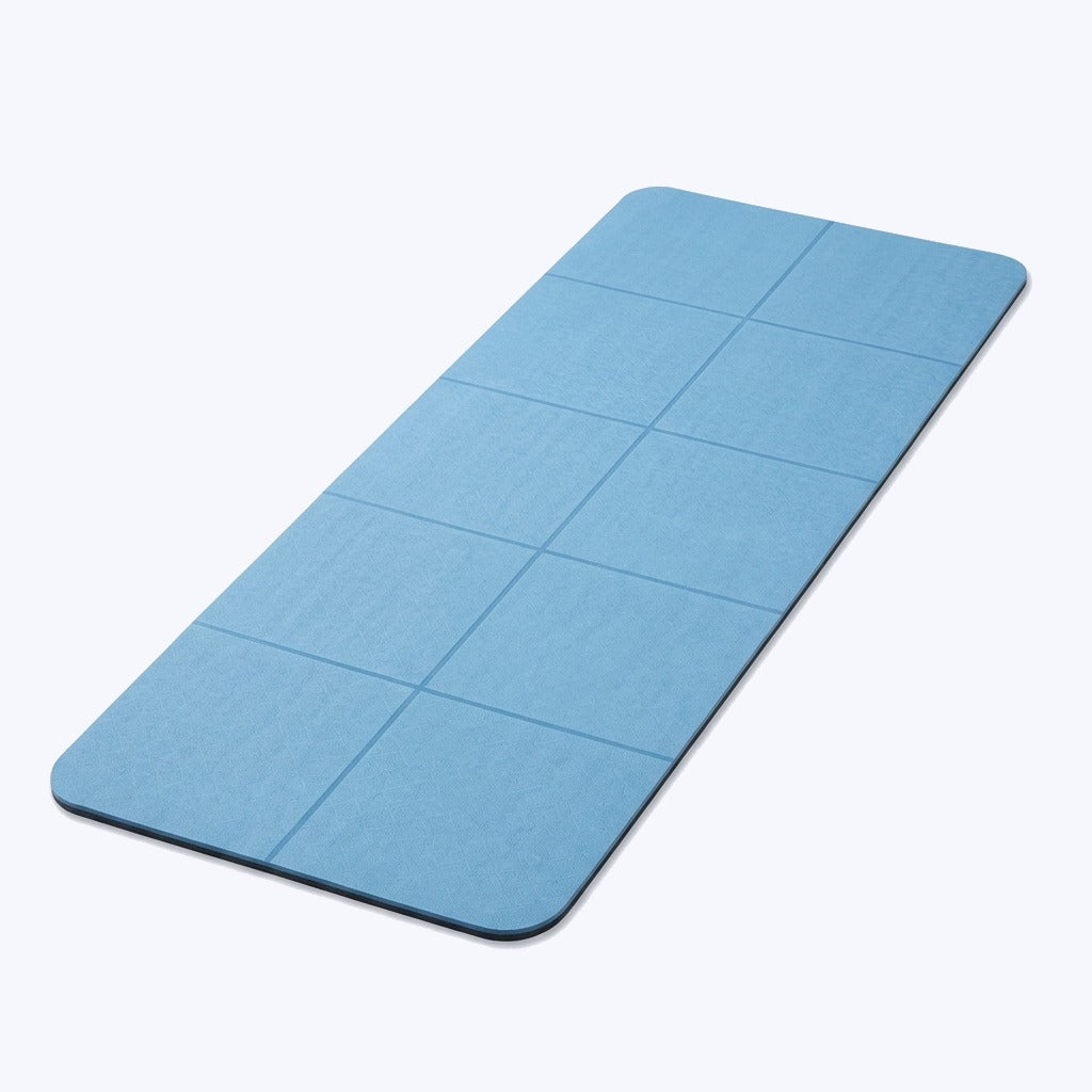 Foldable Yoga Mat - TPE mat that folds into sections with textured grip on both sides
